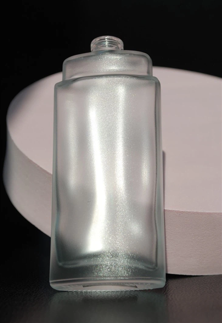 Cosmetic Bottle With Oil-Sand Surface